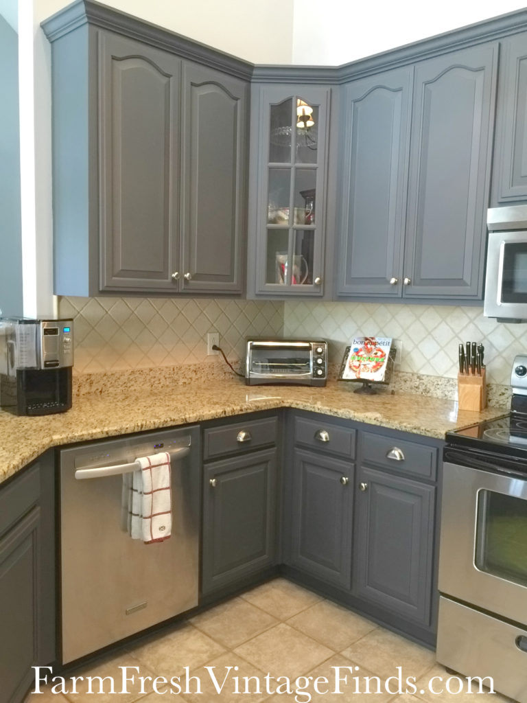 Dark wax over hideous honey oak cabinets 